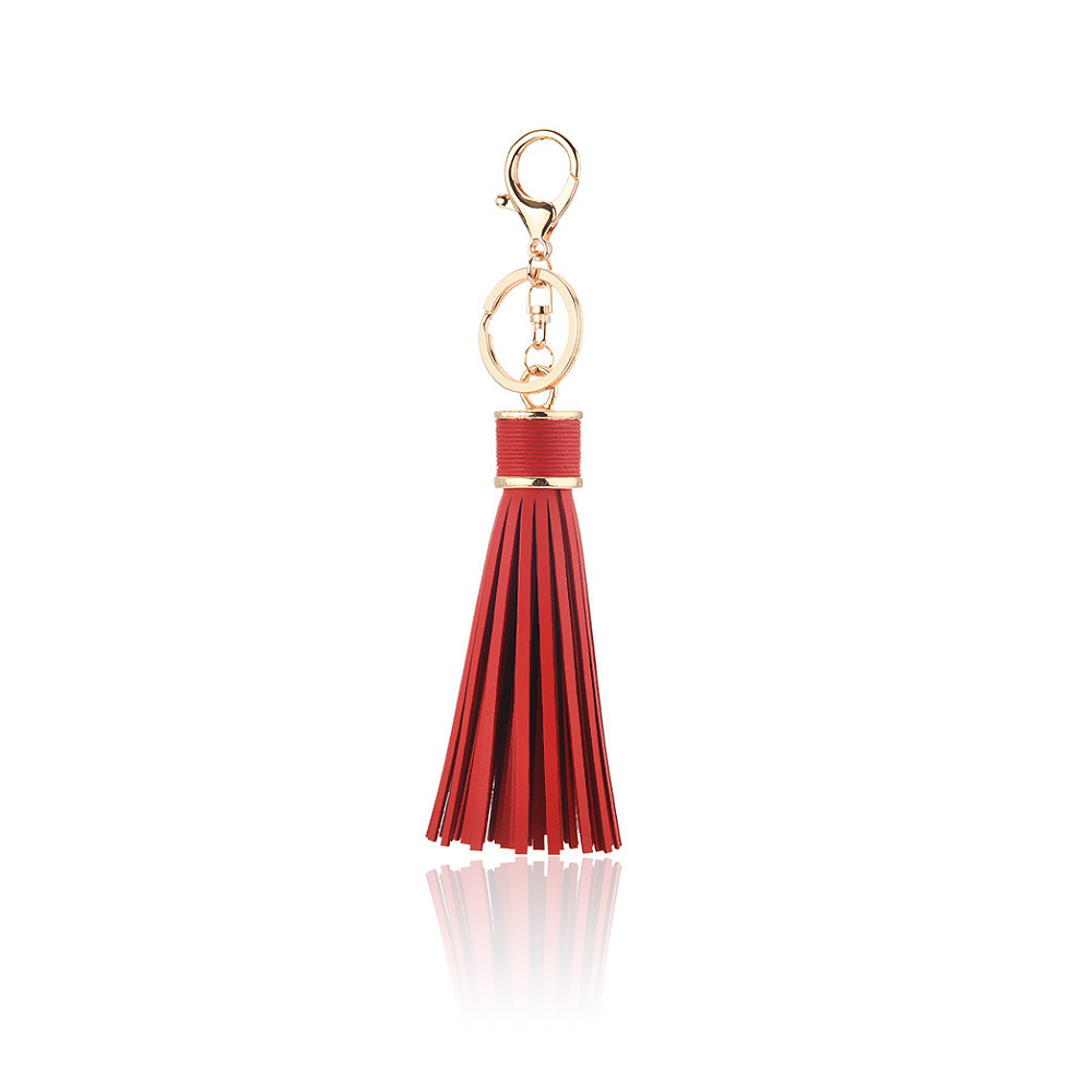Close-up of the red leather tassel and gold lobster clasp