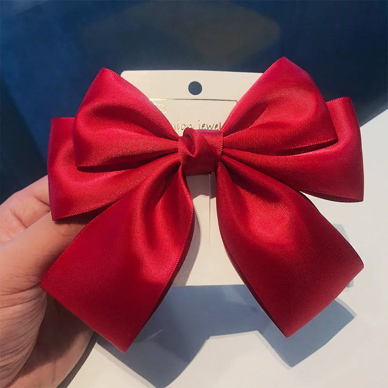 Detailed view of the red vintage bowknot hair clip