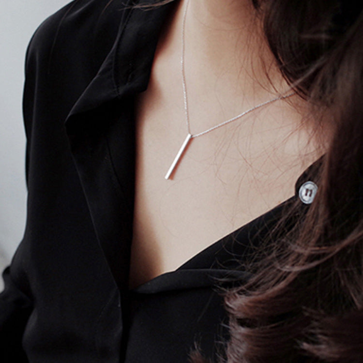 Model wearing the minimalist 925 silver bar pendant necklace
