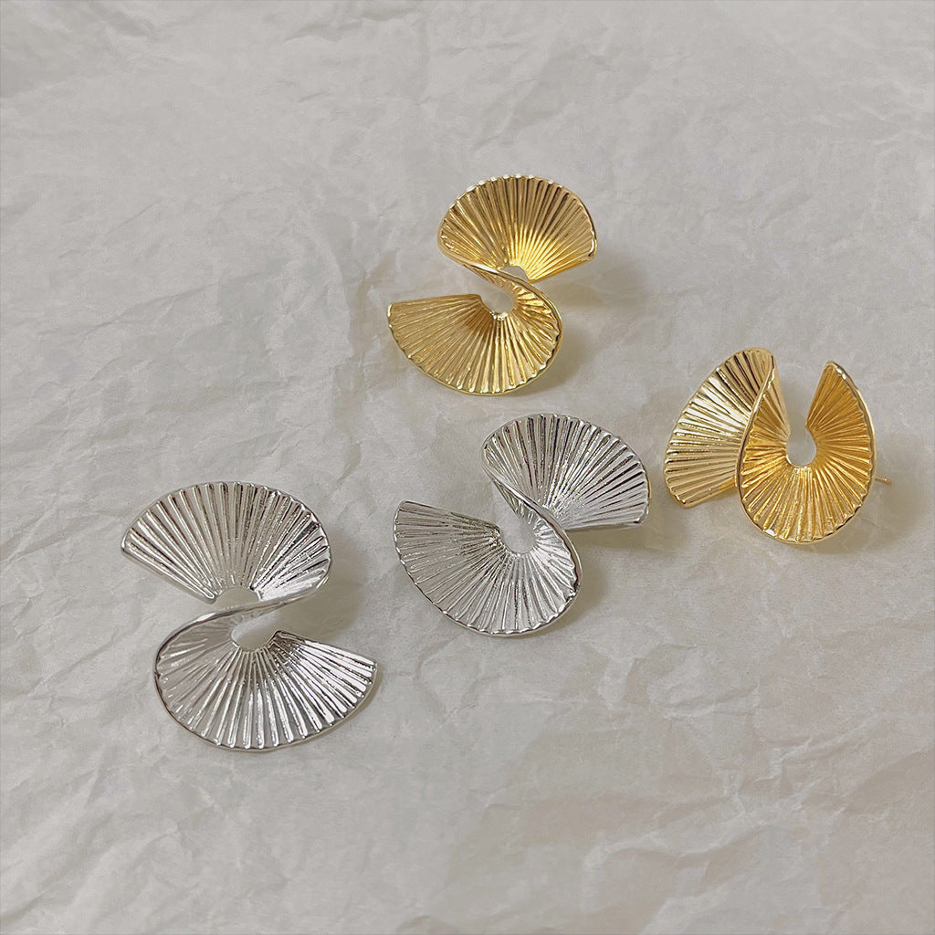 Minimalist geometric earrings in both gold and silver finishes