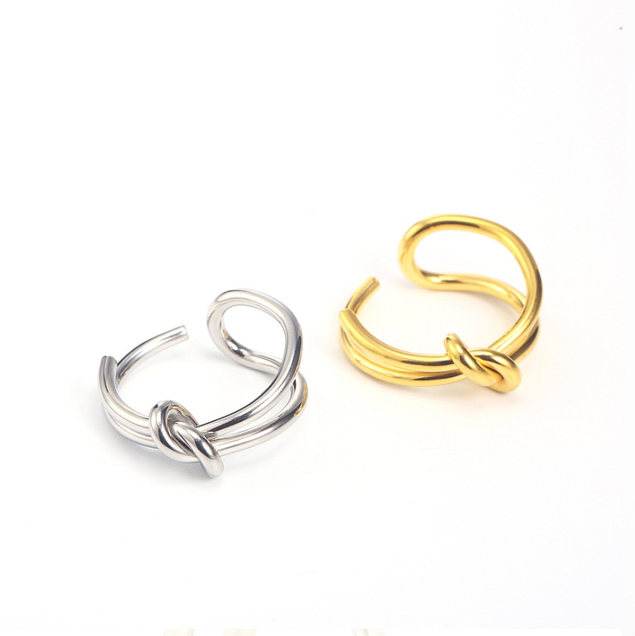 Silver and gold knot earrings