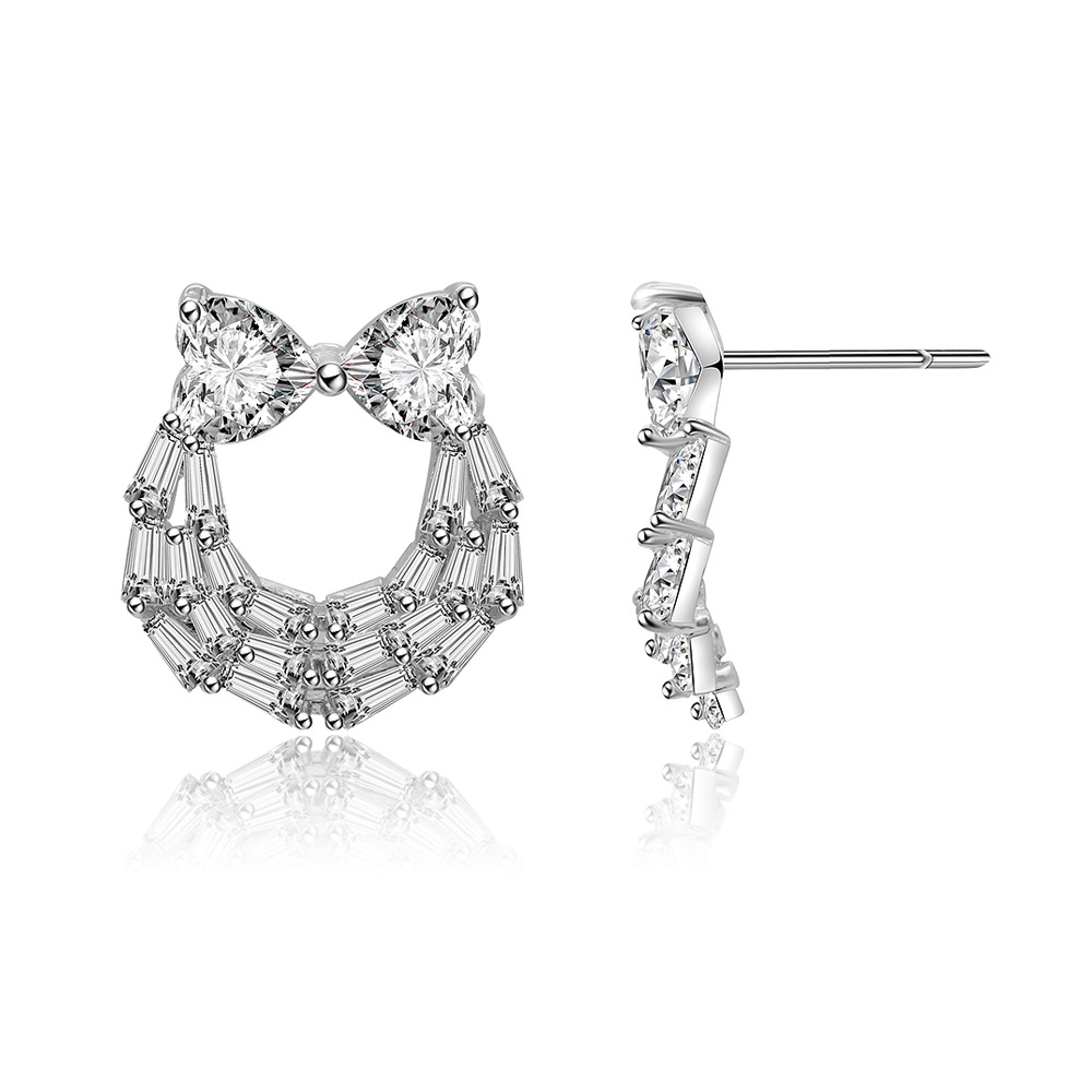 Detailed view of the Two Hearts And Baguette Earrings showcasing the baguette-cut stones
