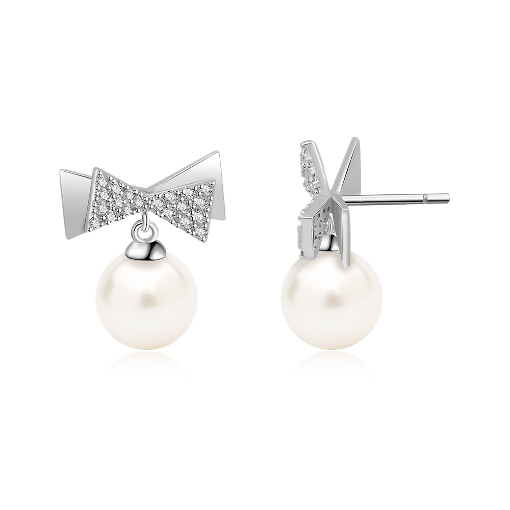 Detailed view of the Bow 7mm Pearl Drop Earrings