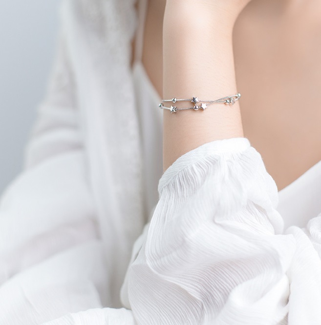 Detailed view of the 925 Sterling Silver Star Bracelet's decorative elements and clasp.
