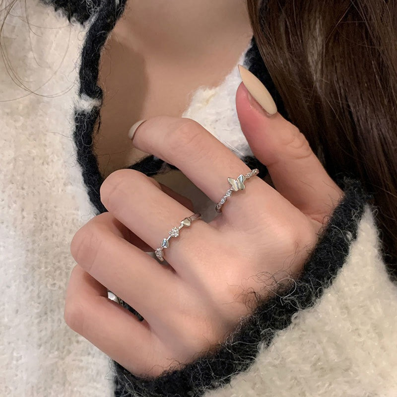 Close-up of the sterling silver butterfly rings with CZ stones