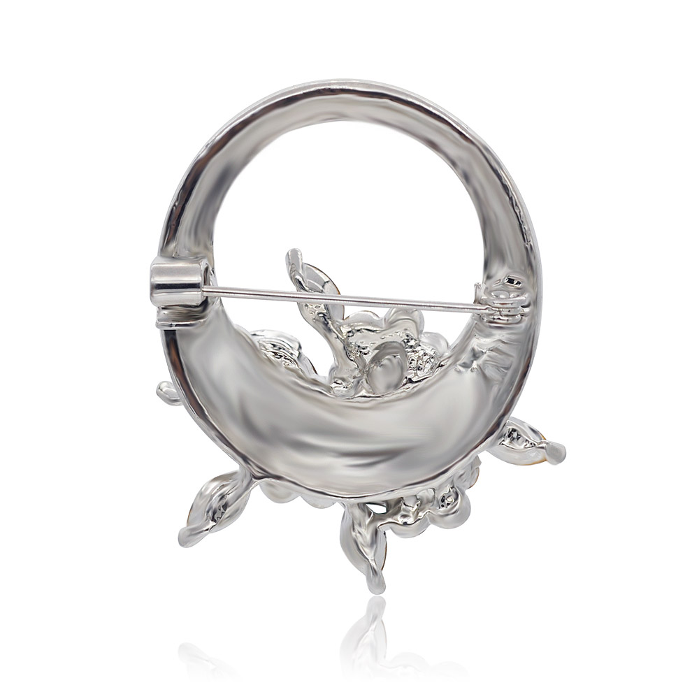 Back view of the brooch showing the C-pin closure and quality metalwork