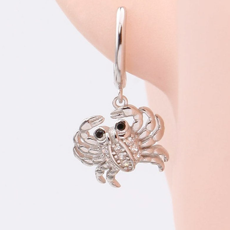 Silver crab earring with sparkling stones