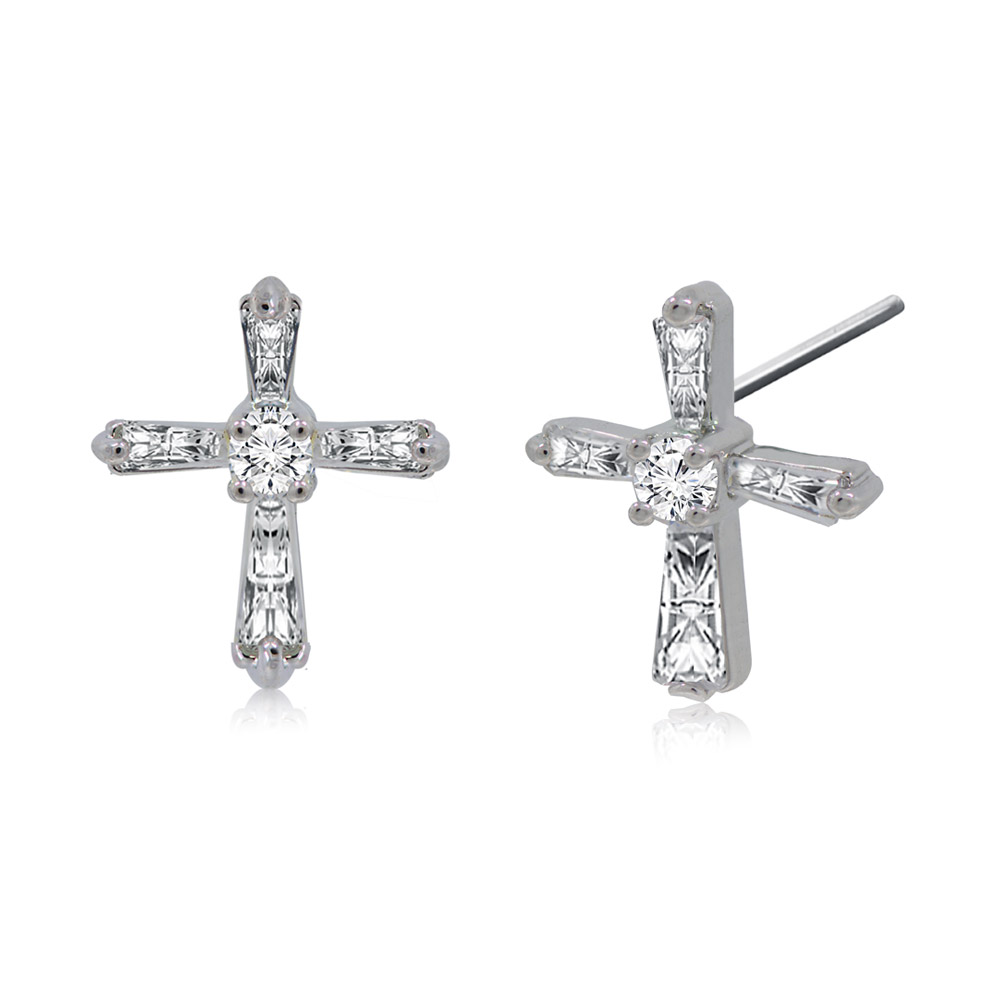 A pair of Vatican Cross stud earrings on display