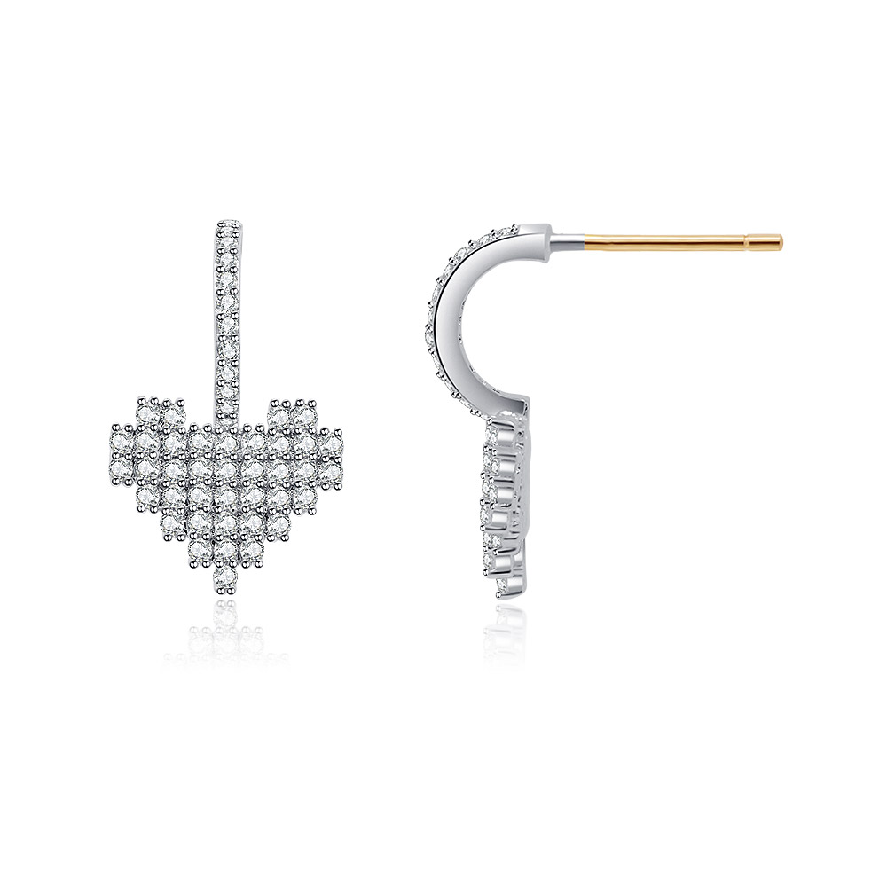 Detailed view of the rhodium plated cross earrings with sparkling cubic zirconia
