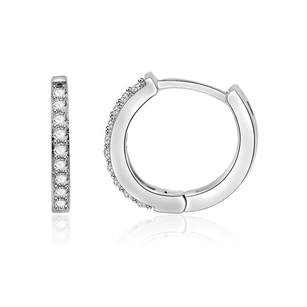 Detailed view of the CZ stones on the huggie earrings