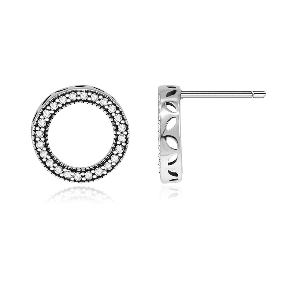 A detailed close-up of the Mini Silver Circles Ear Studs showcasing the brilliant cubic zirconia stones.