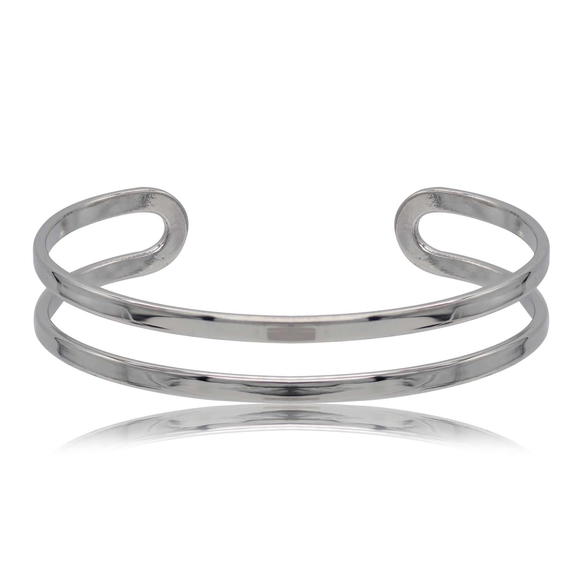 Detailed view of the Twirling Silver Cuff's polished finish and asymmetrical design