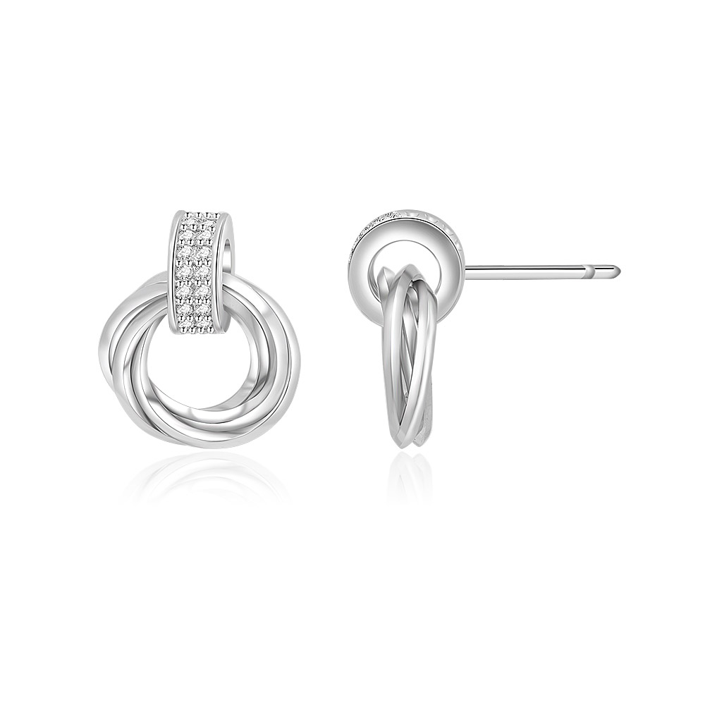 A pair of Chic Circle Interlock Studs shown from an angle