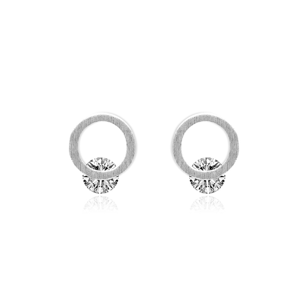 A pair of Tiny Round Silver Plated CZ Earrings on a neutral background