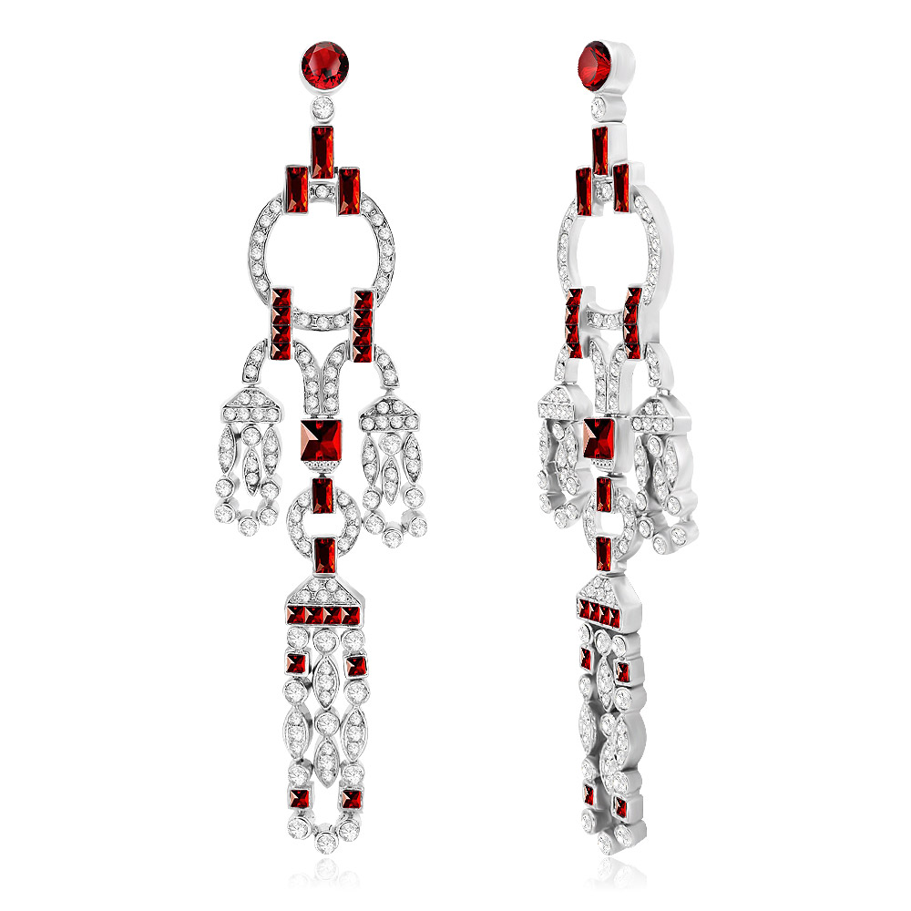 Detailed view of the long drop zirconia earrings with red and white stones