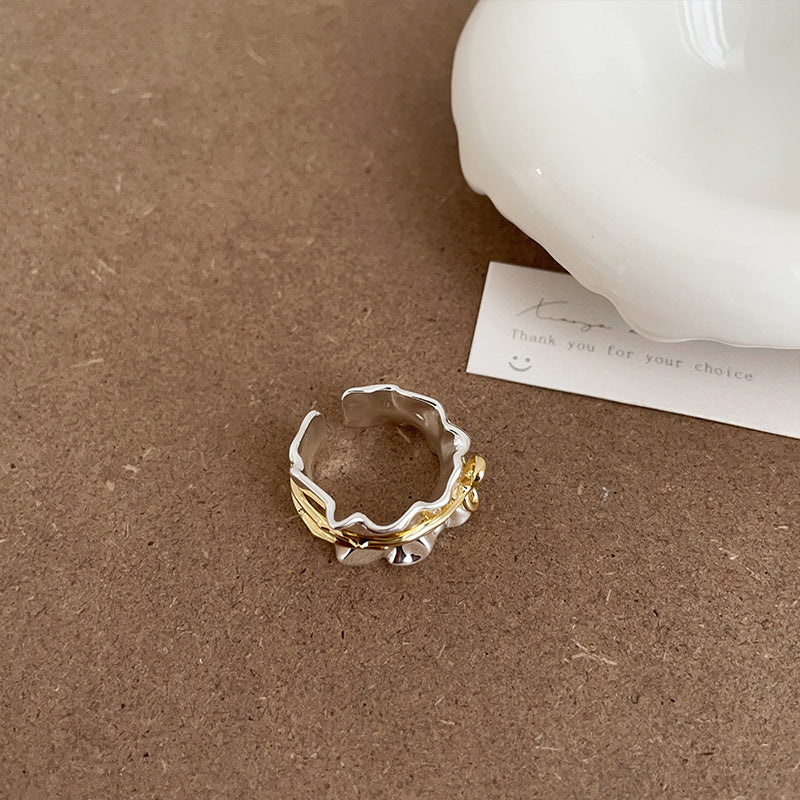 Detailed view of the brass gold and silver plated bow ring