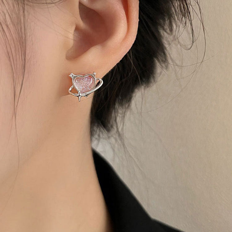 Close-up of the sterling silver heart stud earring