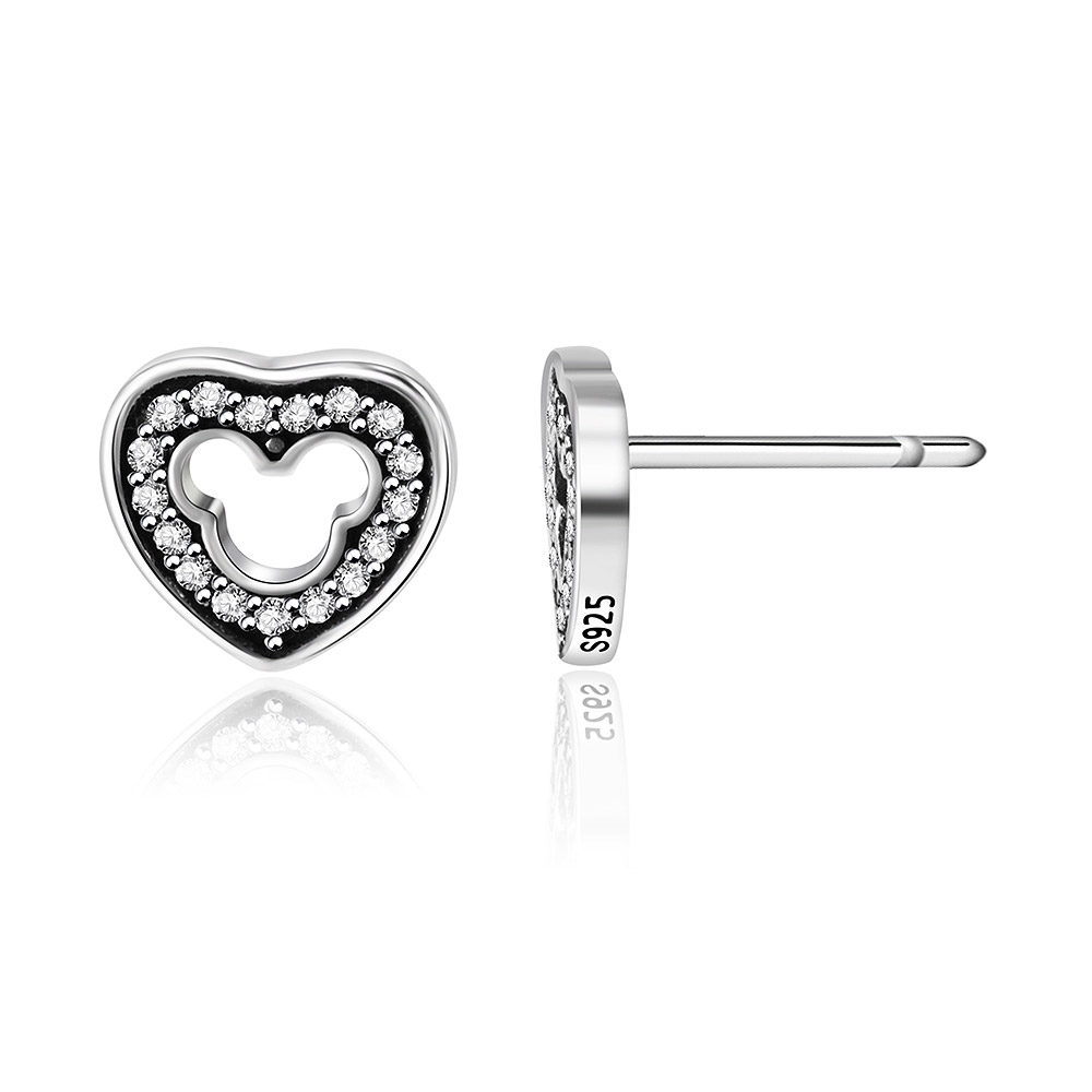 Close-up of S925 sterling silver stamp on heart earrings