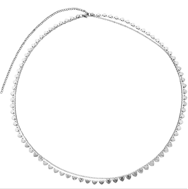 Close-up of the silver necklace with a double-layered chain and heart-shaped beads