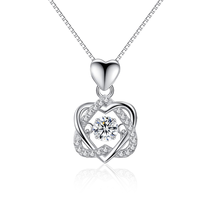 Detailed view of the Interlock Two Heart Pendant Necklace on a neutral background