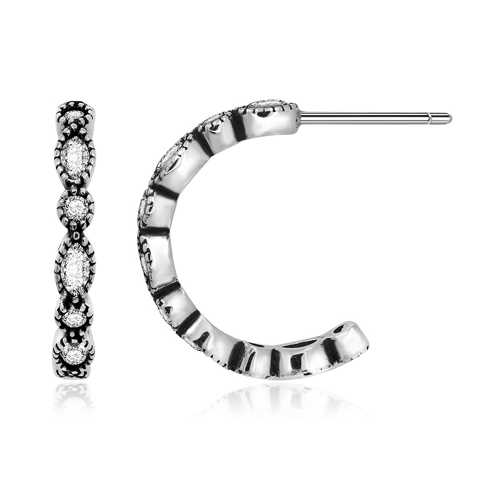 A detailed look at the zirconia setting on the half hoop earring