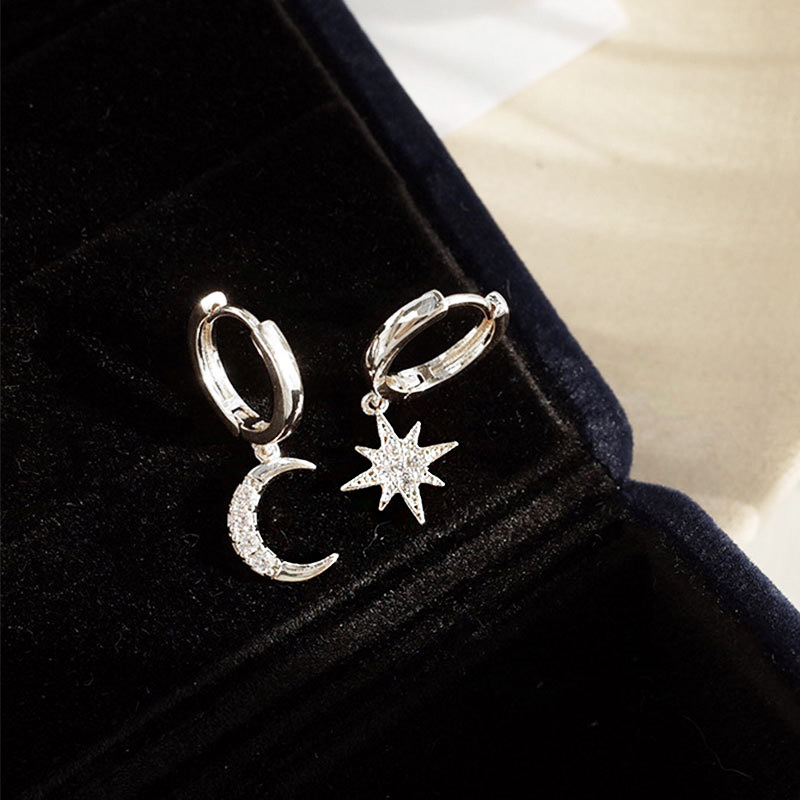Silver version of the 925 sterling silver star and moon earrings