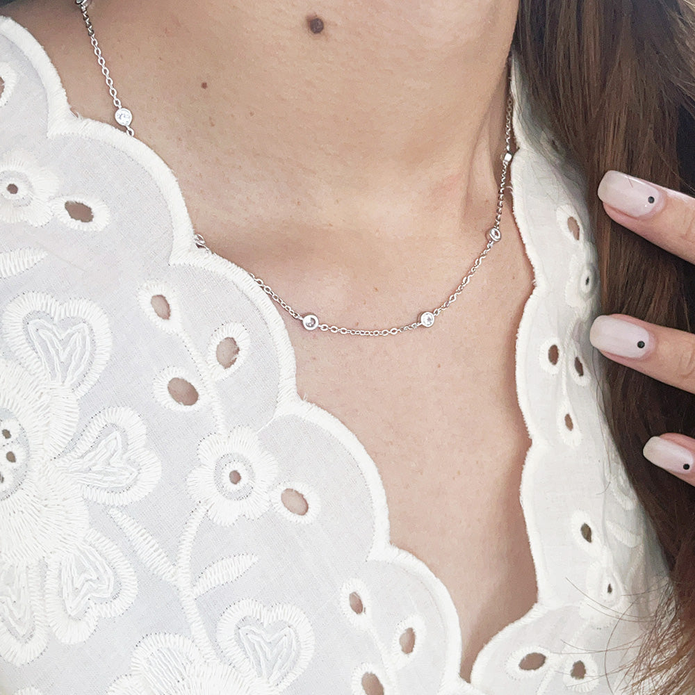 Model wearing the 925 sterling silver 4mm CZ stone charm necklace