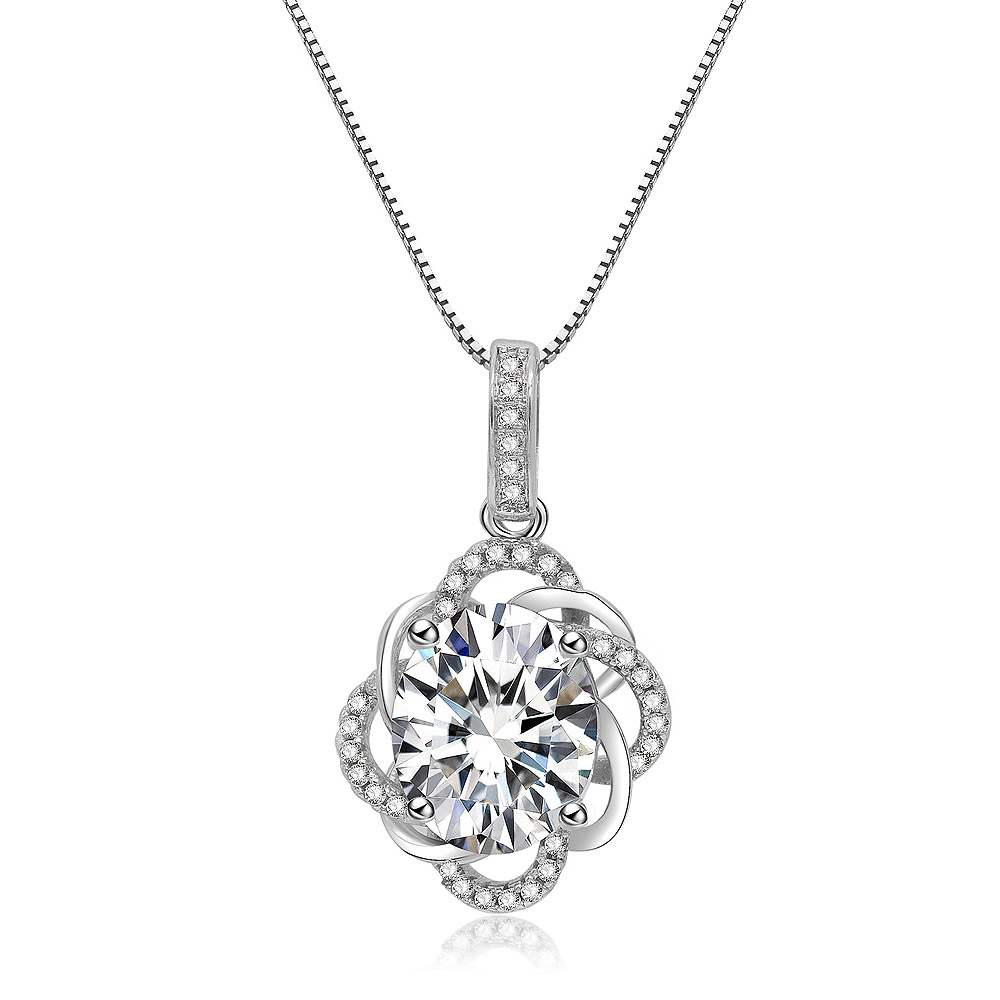 Detailed view of the Glistening Pendant's floral design
