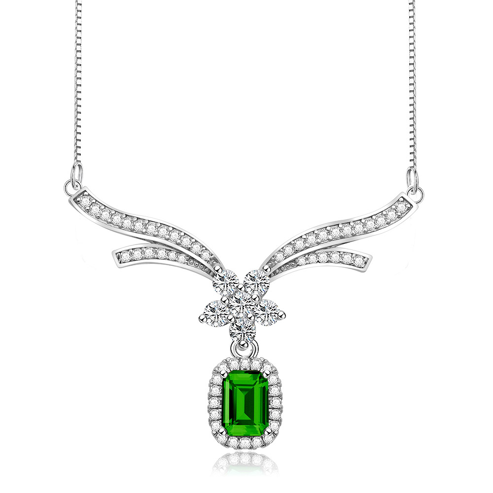 Detailed close-up of the emerald cubic zirconia pendant