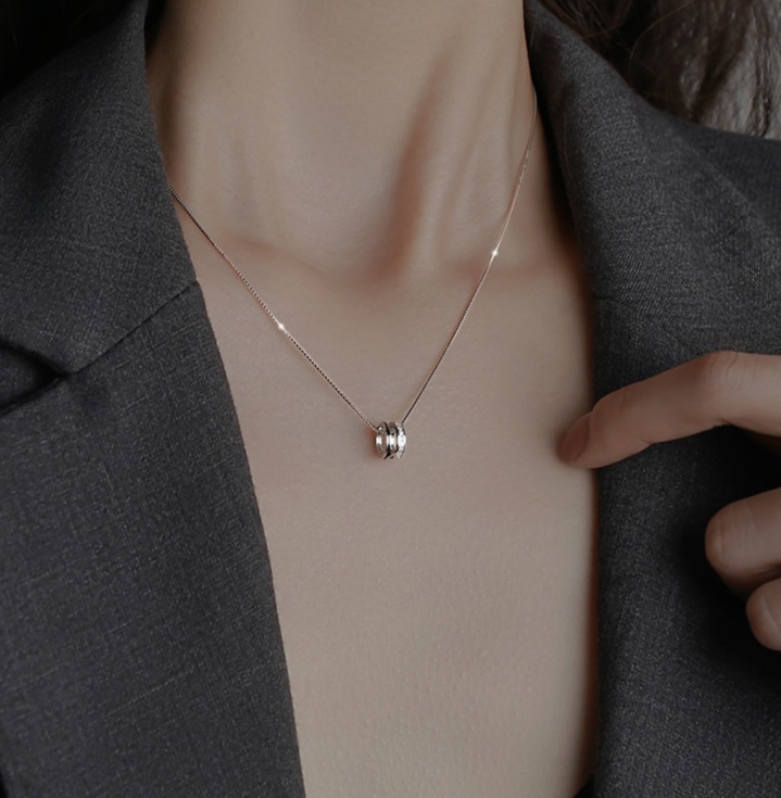 Geometric Round Circle Necklace in a silver finish option.