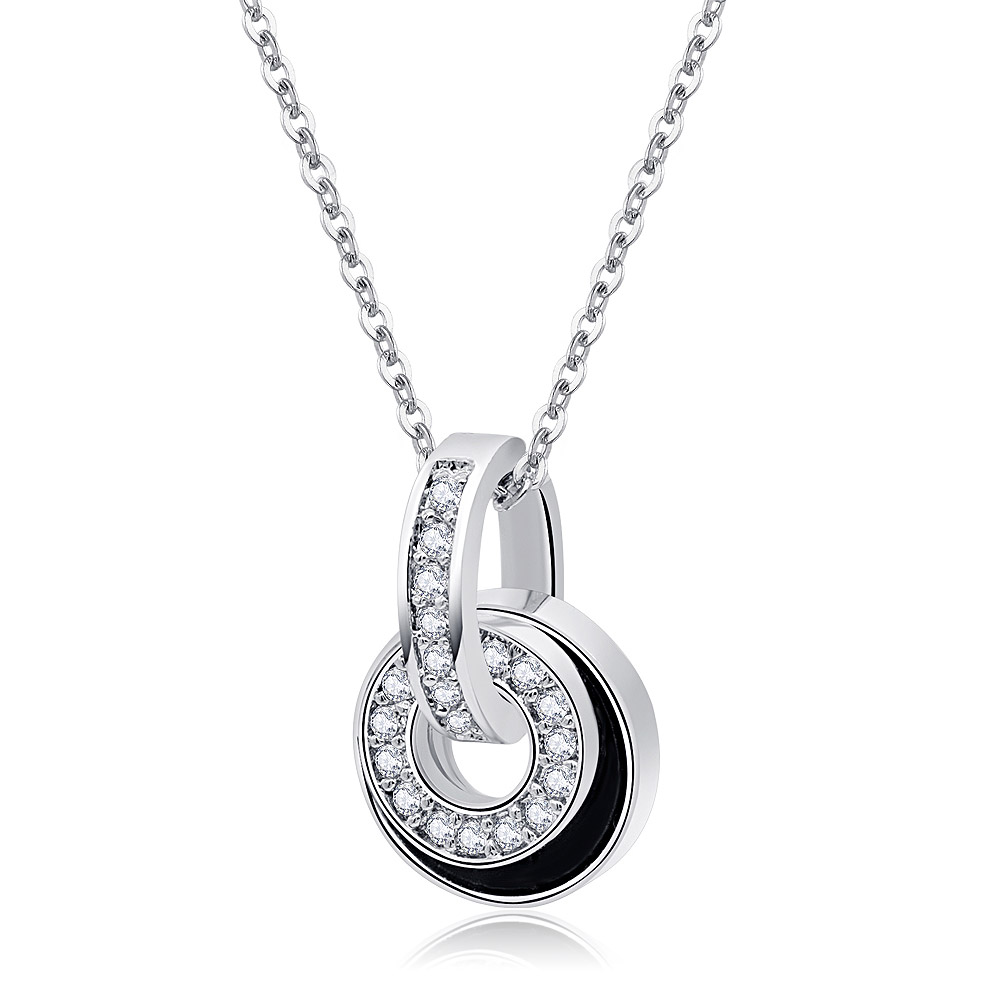 Detailed view of the double circle pendant with encrusted cubic zirconia stones