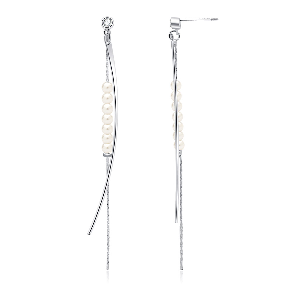 Detailed view of the Multi Chain Pearl Drop Earrings