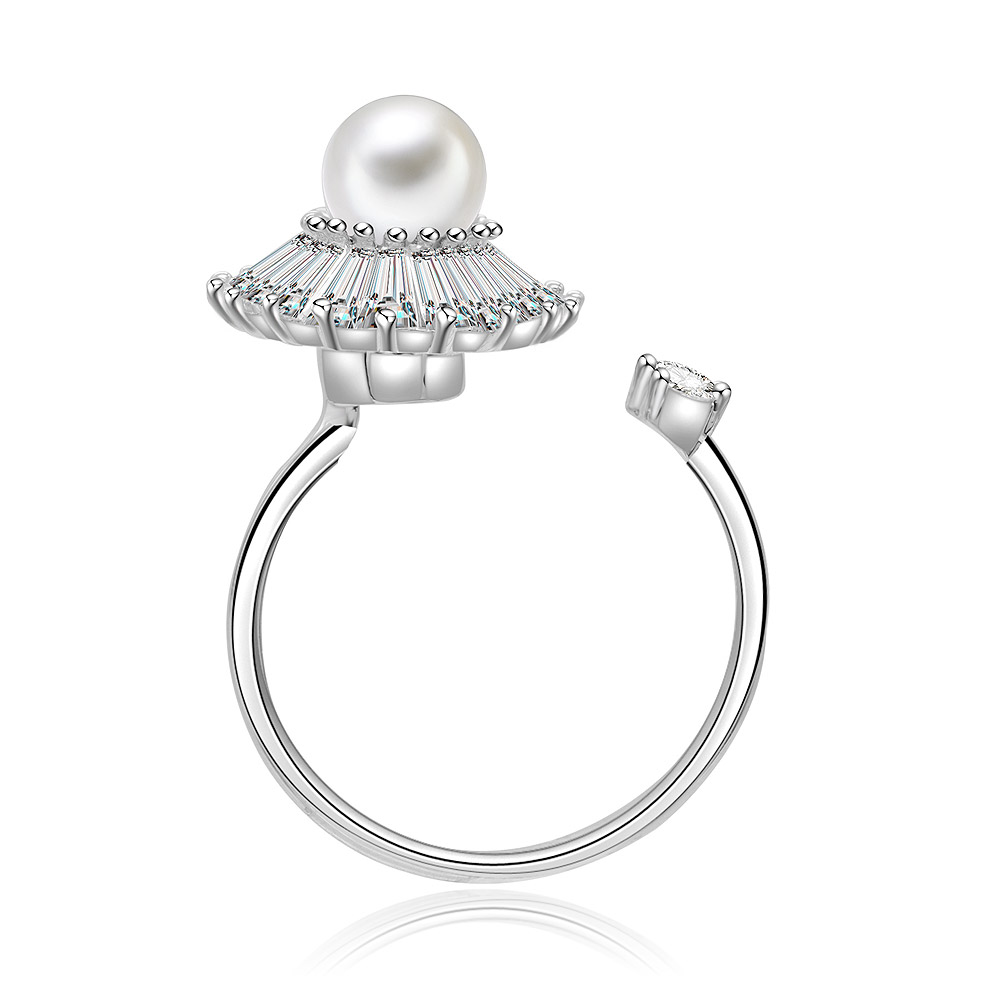 Top view of the Spinning Pearl Ring showcasing its gemstone halo