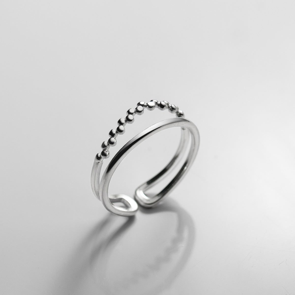 Detailed view of the beaded edge on the sterling silver ring