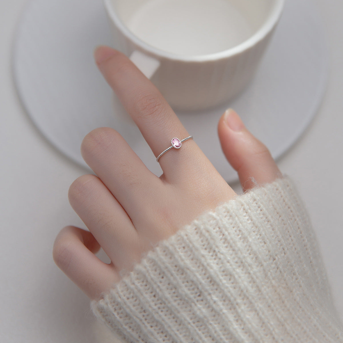 Detailed view of the pink cubic zirconia sterling silver ring