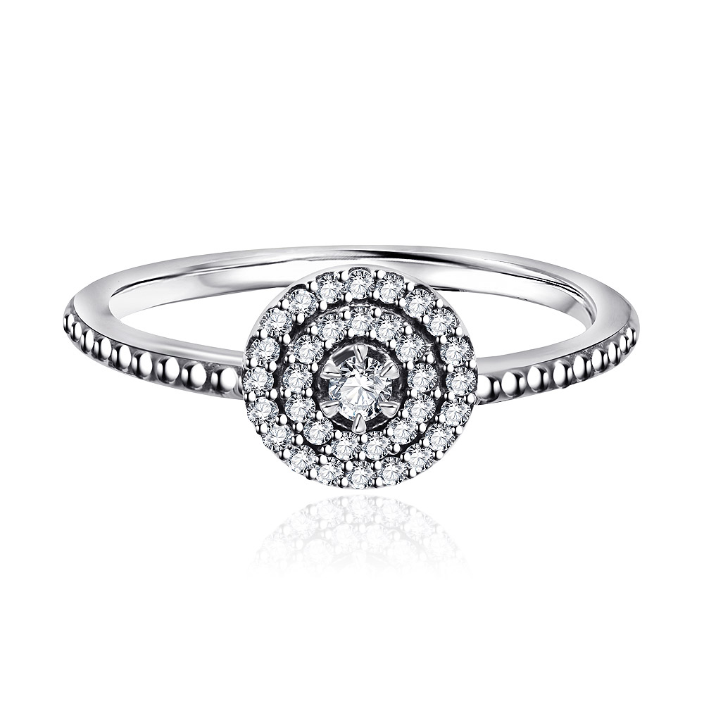 A detailed shot of the 925 Sterling Silver Ring Radiant Elegance on a reflective surface.