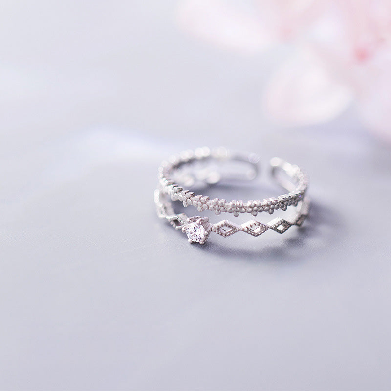 A collection of S925 silver flower lace rings with CZ stones