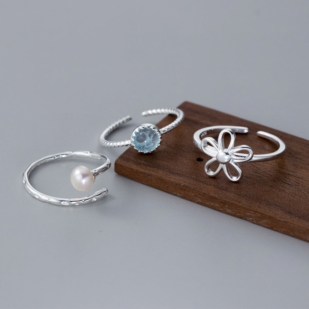 Three sterling silver rings from the Fresh Sweet Bloom set displayed together