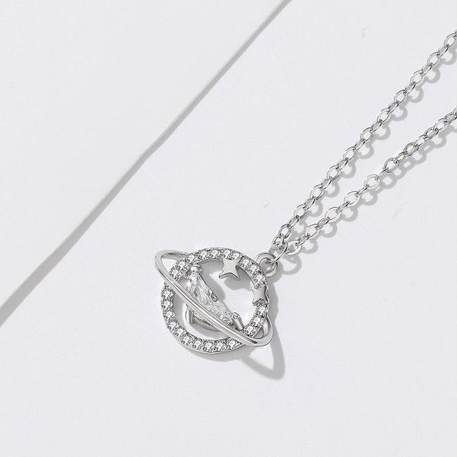 A stylish 925 sterling silver necklace showcasing a Saturn-shaped pendant with delicate stone accents.
