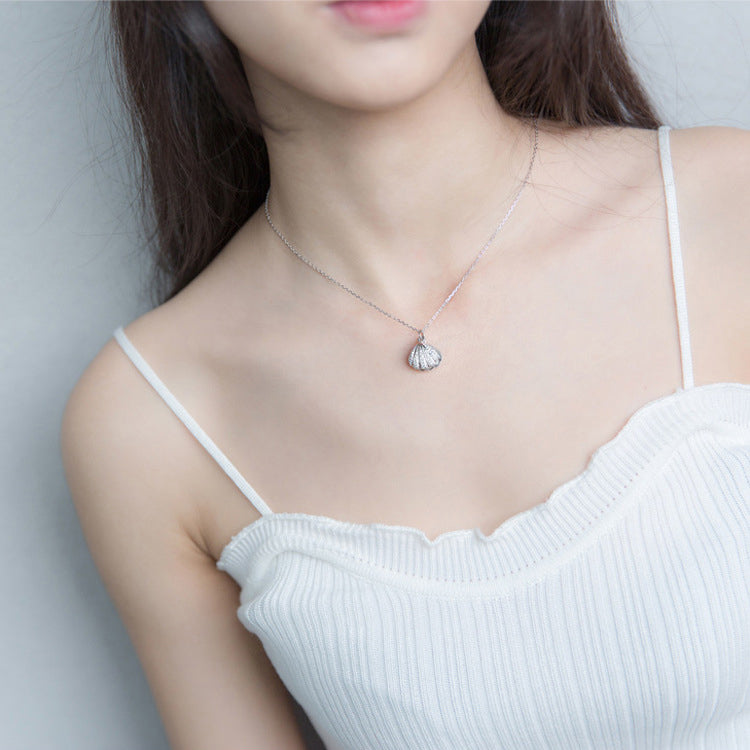 Model wearing the 925 Sterling Silver Pearl in Sea Shell Pendant Necklace
