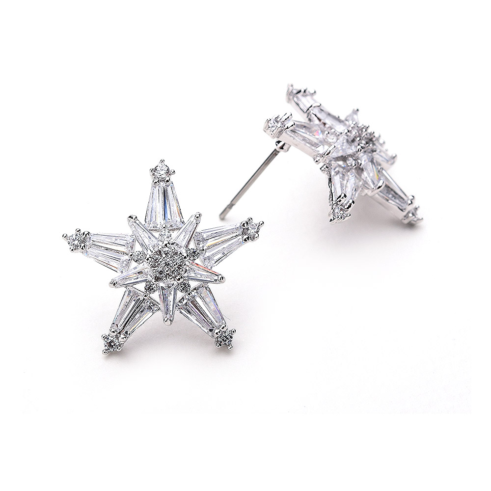 A close-up view of the Dainty Star Stud Earrings showcasing the intricate cubic zirconia setting.