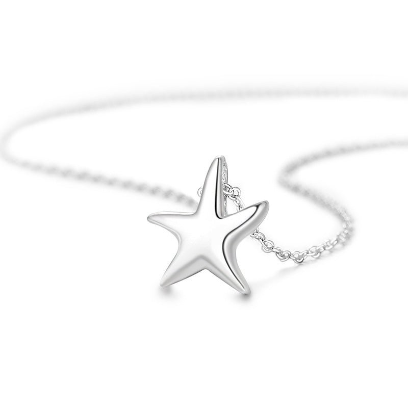 A sterling silver starfish necklace from the five-piece set