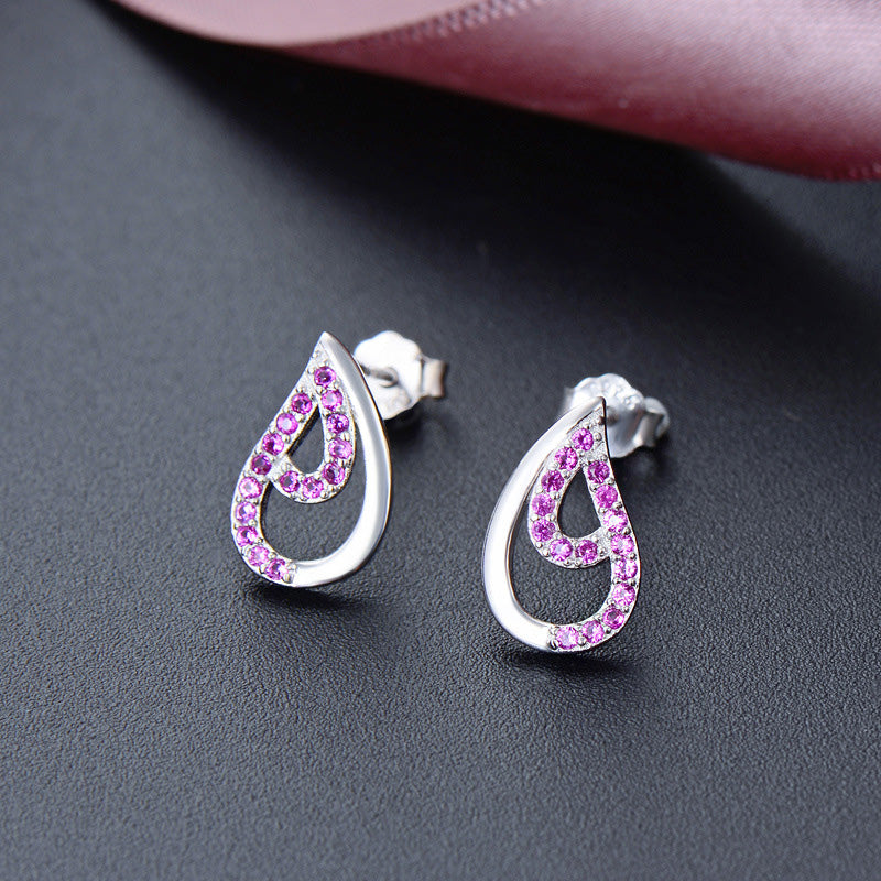 Detailed view of pink cubic zirconia water drop earrings