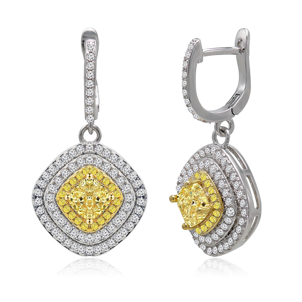 Detailed view of the cushion shape stud earring's craftsmanship and two-tone plating.
