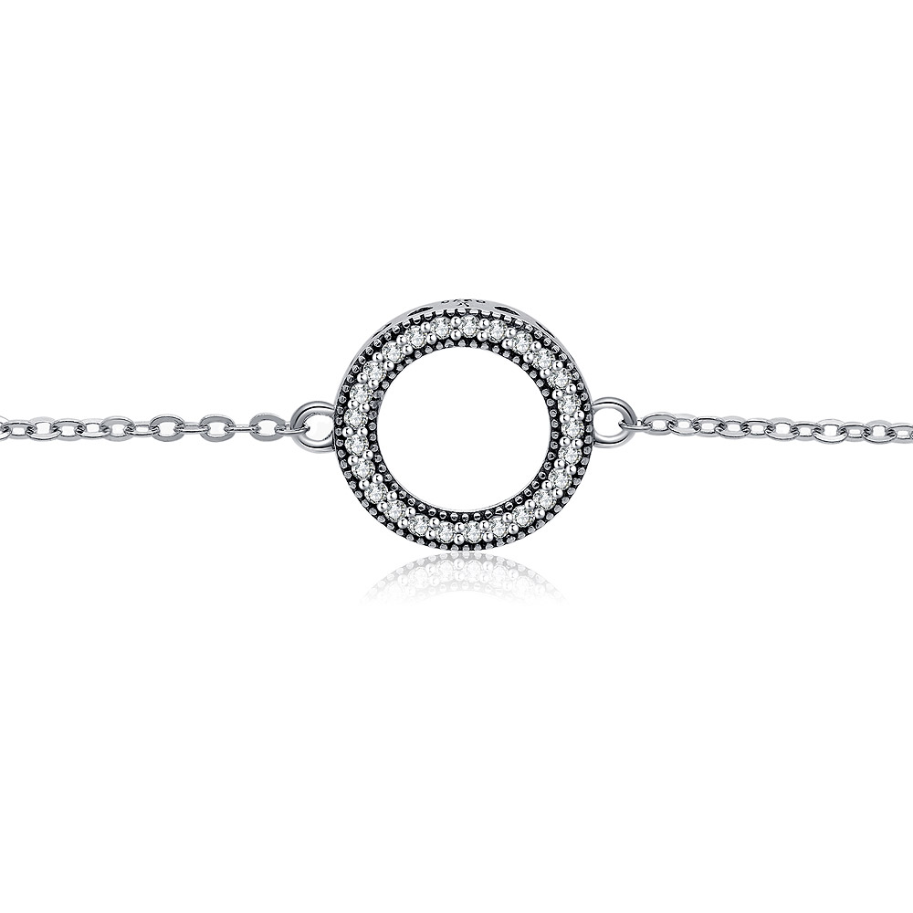 A detailed close-up of the Circle Halo CZ Pave Bracelet's pendant