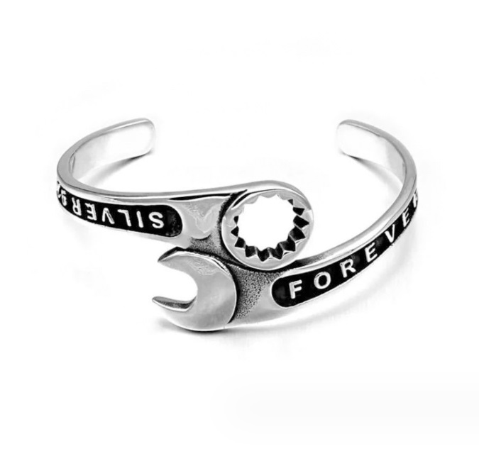 Detailed view of the wrench and gear design on the men's tool bangle bracelet