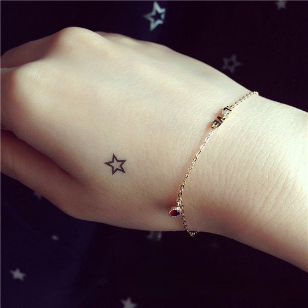 Model wearing the 14K gold plated love pendant necklace