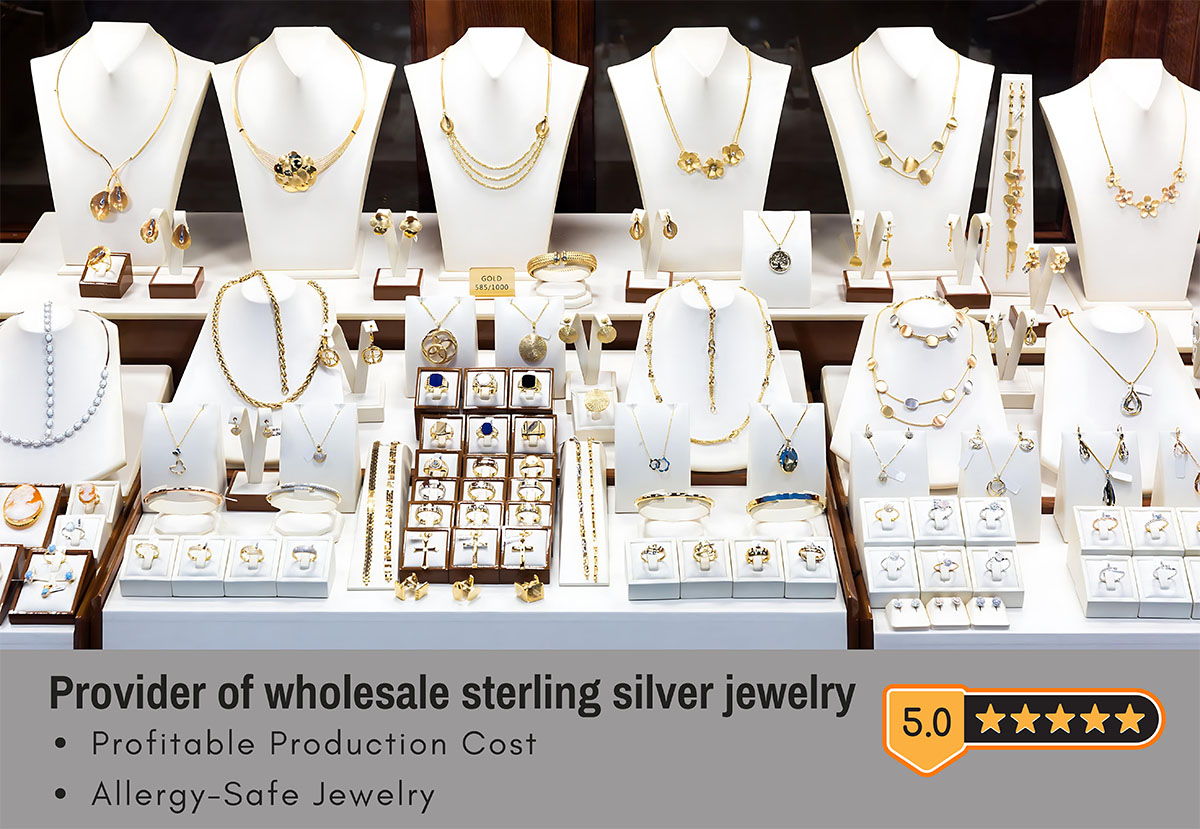 A diverse display of wholesale sterling silver jewelry including rings and necklaces.