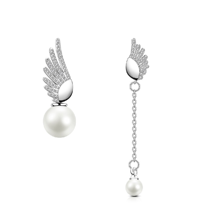 Detailed view of the Angel's Wings Chain Earrings with pearl and CZ