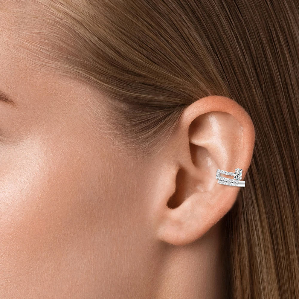 A model wearing the non-pierced CZ pave ear cuff on her mid-ear.